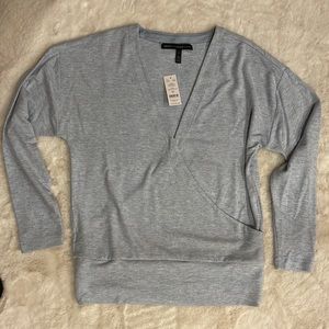 WHBM light blue faux wrap knit top.  Size Small.